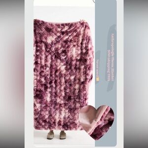 Cozy Anthropologie throw blanket